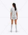 Female Soccer Player Wearing Jersey and Shorts Mockup