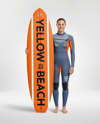 Female Surfer Wearing Wetsuit with Shortboard Mockup
