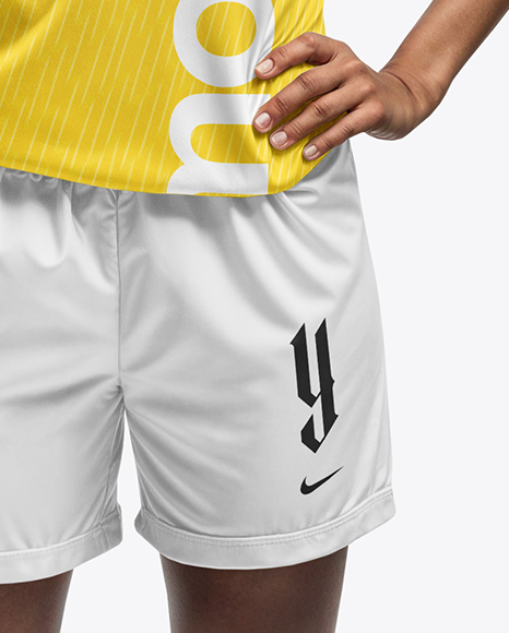 A Black Woman Wearing a Full Soccer Kit with a Ball Mockup
