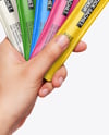 Five Sachets in a Hand Mockup