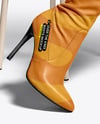 Pair of Over-The-Knee Boots on Women's Legs on Stool Mockup