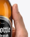 Amber Glass Beer Bottle in a Hand Mockup