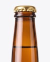 Amber Glass Beer Bottle in a Hand Mockup