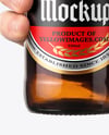 Amber Glass Beer Bottle in a Hand Mockup