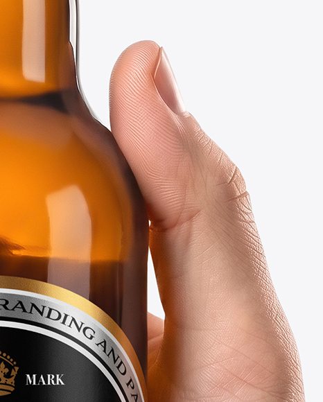 Amber Glass Beer Bottle in a Hand Mockup