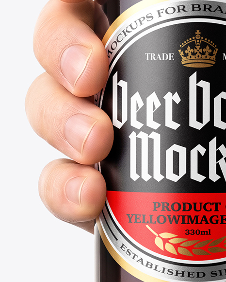Amber Glass Beer Bottle in a Hand Mockup