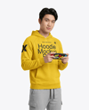 Asian Man Wearing Hoodie with Portable Console Mockup