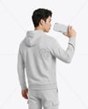 Asian Man Wearing Hoodie with Portable Console Mockup