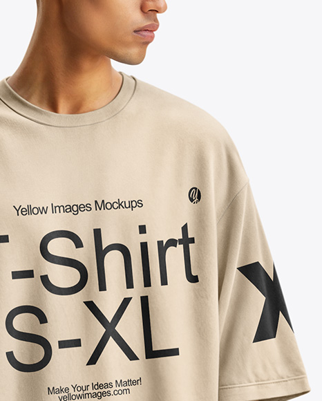 Man Wearing an Oversize T-shirt and Sweatpants Mockup