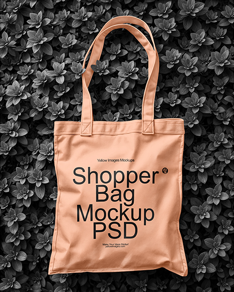 Tote Bag on a Leafy Greens Background Mockup