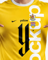 Man Wearing Soccer Jersey and Shorts Mockup