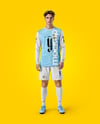 Soccer Player Wearing Long Sleeve Jersey and Shorts Mockup