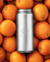 16oz Drink Can on a Stack of Oranges Mockup