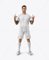 Man Wearing Soccer Jersey and Shorts Mockup