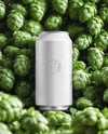 Beer Can on Fresh Hops Background Mockup
