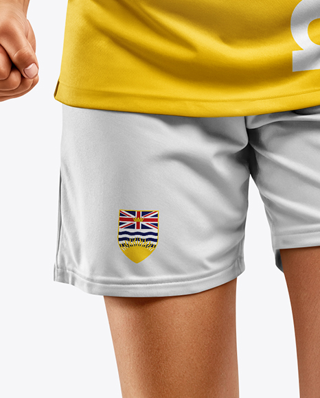 Female Soccer Player Wearing Jersey and Shorts Mockup