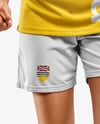 Female Soccer Player Wearing Jersey and Shorts Mockup