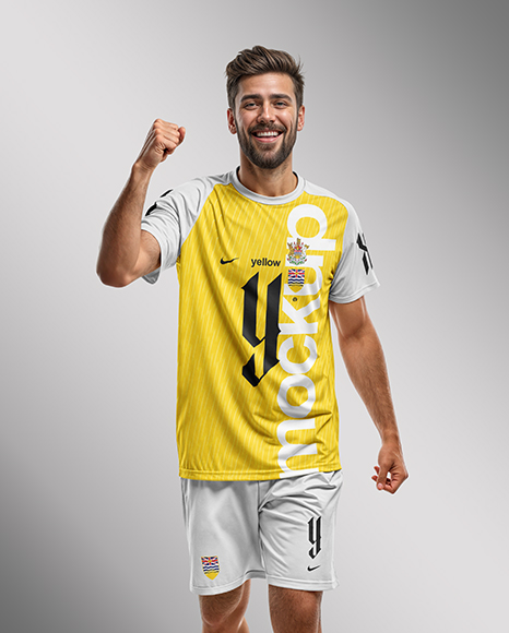 Soccer Player Wearing Raglan Jersey and Shorts Mockup