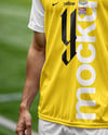 Soccer Player Wearing a Jersey and Shorts at the Stadium Mockup