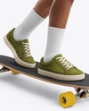 Black Woman Wearing T-Shirt and Shorts Standing on Longboard Mockup