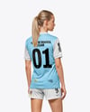 Female Soccer Player Wearing Jersey and Shorts Mockup