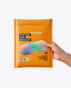 Postage Bag in a Hand Mockup