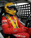 Man Wearing Racing Kit In Nascar Car Mockup