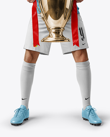 Man Wearing Soccer Jersey and Shorts Holds Cup Mockup