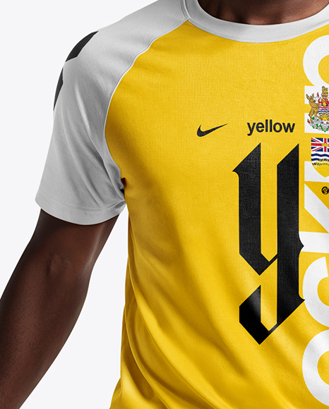 Soccer Player Wearing Raglan Jersey and Shorts Mockup