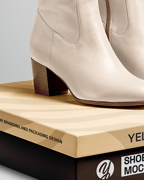 Pair of Women's High-Knee Boots on Shoe Box Mockup
