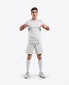 Man Wearing Soccer Jersey and Shorts Mockup