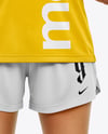 Woman Wearing Soccer Jersey and Shorts Mockup
