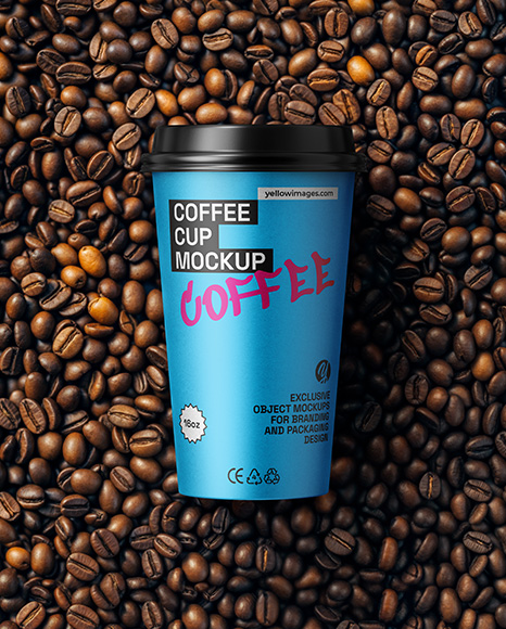 16oz Paper Cup on a Stack of Coffee Beans Mockup - Coffee packaging mockup