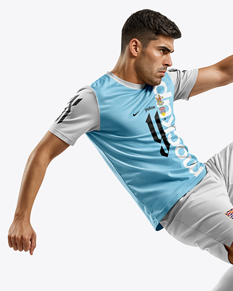 Man Wearing Soccer Jersey and Shorts Mockup