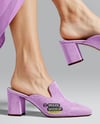 Pair of Suede Mules on Woman's Legs Mockup