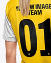 Female Soccer Player Wearing Jersey and Shorts Mockup