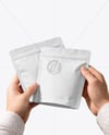 Two Matte Stand-Up Pouch in Hands Mockup
