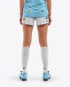 Female Soccer Player Wearing Jersey and Shorts Mockup
