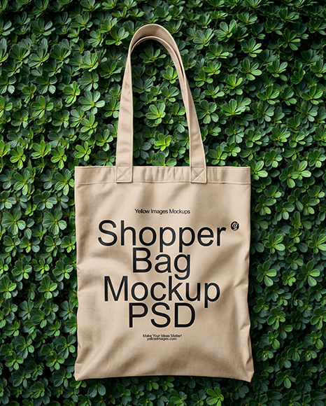 Tote Bag on a Green Leafy Background Mockup - Canvas+Bag+Mockup+In+Apparel+Mockups+On+Yellow+Images+Object+Mockups