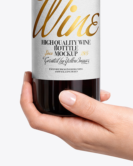 Red Wine Bottle in Hands Mockup