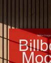 Billboard on a Wall with Wooden Slats Mockup