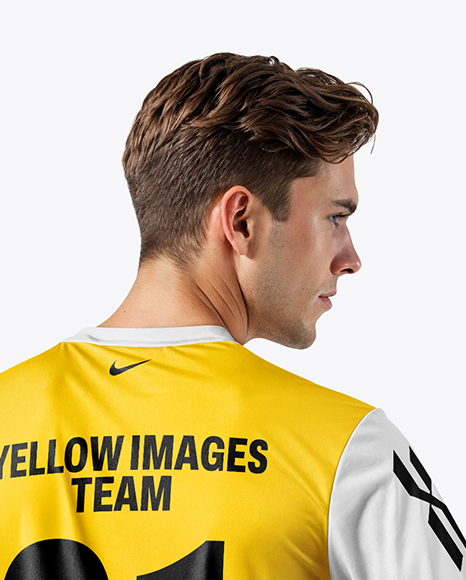 Man Wearing Soccer Jersey and Shorts Mockup