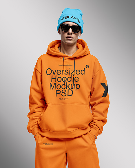 Young Man Wearing Oversize Hoodie and Beanie Hat Mockup