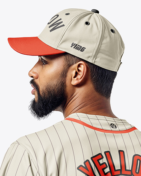 Afro-American Baseball Player Wearing a Jersey and Cap Holding a Bat Mockup