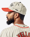 Afro-American Baseball Player Wearing a Jersey and Cap Holding a Bat Mockup
