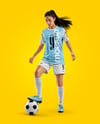 Woman Wearing Soccer Jersey and Shorts Mockup