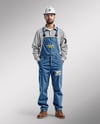 Builder Wearing Bib Overalls and Shirt Mockup