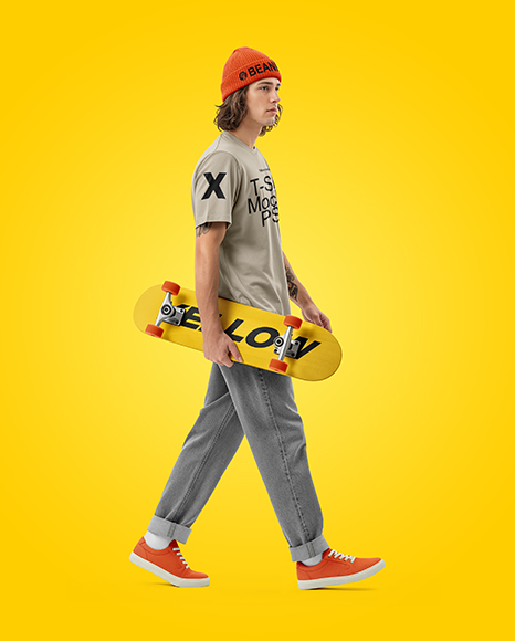 Young Man Wearing T-Shirt and Beanie Hat Holding Skateboard Mockup
