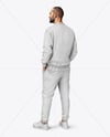 Man Wearing a Sweatshirt and Pants Mockup