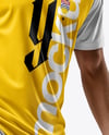 Man Wearing Soccer Jersey and Shorts Mockup
